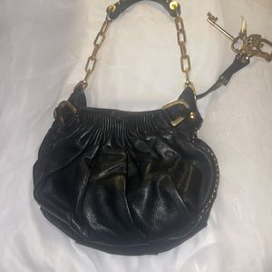 Juicy couture black leather handbag gathered Outer pockets excellent condition